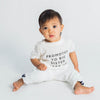 Baby wearing 'Promoted to Big Sis' custom tee